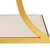 Sidobord i guldmetall med modern design och glasytor.