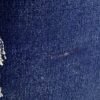 Detaljerad bild av blå kudde för sittande avföringsstol eller pouf.