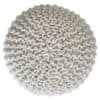 Rund stickad pall i grovt stickat material, beige färg, sittplats höjd 30 cm.
