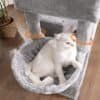 Kattträd med kattgrotta och torn, perfekt för inomhuslek och vila.