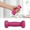 Rosa neopren hantlar för styrketräning och fitness.