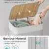 Bambu tvättkorg med lock, handtag och luftning för smidig användning.