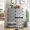 Rektangulärt svart förvaringsskåp med 10 lådor för organiserad förvaring.