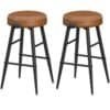 Två kökspallar i faux läder och svart metallram, hög kvalitet, moderna design.