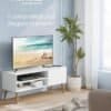 Modern vit TV-bänk för TV upp till 55 tum med förvaring.