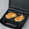 Waffle Brödrost grill med kycklingfiléer för perfekt tillagning.
