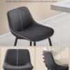 Modern svart stol med ergonomisk design och stödjande ryggstöd.