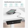 Multifunktionell controller för justering av skrivbordshöjd och funktioner.