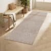 Modern hall runner rug in beige with non-slip backing for home decor.