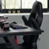 Svart ergonomisk kontorsstol med höjdjustering för hemmakontoret.