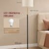 Golvlampa med LED-glödlampa och justerbar höjd, perfekt för vardagsrummet.